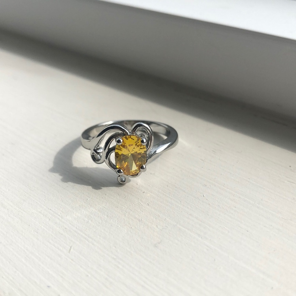 Ring with yellow cubic zirconia
